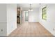 The dining area features tile flooring, natural light, access to the kitchen, and is great for Gathering meals at 4333 Dunwoody Dr, Charlotte, NC 28215