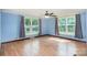 Spacious bedroom with hardwood floors, ceiling fan, and lots of natural light at 439 Neisler Rd, Concord, NC 28025