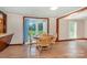 Cozy dining area with wood table, view of yard, and open kitchen access at 439 Neisler Rd, Concord, NC 28025