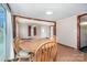 Inviting dining room featuring a wooden table, chairs, and natural light from the window at 439 Neisler Rd, Concord, NC 28025