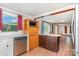 Functional kitchen with a dishwasher, microwave, and plenty of cabinet storage at 439 Neisler Rd, Concord, NC 28025