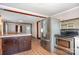Open-concept kitchen with stainless steel appliances and a view to the dining area at 439 Neisler Rd, Concord, NC 28025