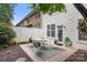 Cozy backyard patio with a table and chairs, perfect for outdoor dining and relaxation at 4442 Coventry Row Ct, Charlotte, NC 28270