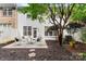 Cozy backyard patio with a table and chairs, perfect for outdoor dining and relaxation at 4442 Coventry Row Ct, Charlotte, NC 28270