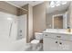 Bright bathroom featuring a shower-tub combo and a white vanity with sleek fixtures at 4442 Coventry Row Ct, Charlotte, NC 28270