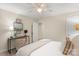Bedroom featuring a bed with a decorative desk, and a window at 4442 Coventry Row Ct, Charlotte, NC 28270