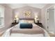 Inviting bedroom featuring a decorative bed, bedside lamps, and neutral wall decor at 4442 Coventry Row Ct, Charlotte, NC 28270