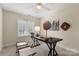 Bedroom featuring a ceiling fan, carpet, and decor at 4442 Coventry Row Ct, Charlotte, NC 28270