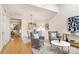Spacious living room with an open floor plan, featuring hardwood floors at 4442 Coventry Row Ct, Charlotte, NC 28270
