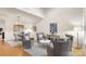 Bright living room featuring modern decor and high ceilings at 4442 Coventry Row Ct, Charlotte, NC 28270