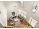 Lofted view of the living area highlighting the high ceilings and natural light from large windows at 4442 Coventry Row Ct, Charlotte, NC 28270
