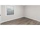 Bedroom featuring wood flooring and natural light at 4601 Coronado Dr, Charlotte, NC 28212