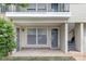 Charming covered patio featuring a private entrance, perfect for enjoying the outdoors at 4601 Coronado Dr, Charlotte, NC 28212