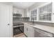 Kitchen featuring stainless steel appliances, grey subway tile backsplash and granite countertops at 4601 Coronado Dr, Charlotte, NC 28212