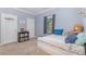 Bedroom with bed, a window with curtains, and a basketball hoop above a door at 500 Mount Pleasant N Rd, Mount Pleasant, NC 28124