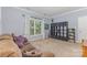 Bedroom with carpet, bookcase, and window at 500 Mount Pleasant N Rd, Mount Pleasant, NC 28124