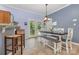 Cozy dining area with French doors leading to outdoor space, and stylish furnishings at 500 Mount Pleasant N Rd, Mount Pleasant, NC 28124
