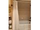Bathroom showcasing tub, shower and white shower curtain at 5112 Mill Race Ln, Lancaster, SC 29720