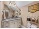 Bright bathroom with granite counters and decorative fixtures at 5112 Mill Race Ln, Lancaster, SC 29720