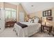 Comfortable bedroom with neutral tones, sitting area, and natural light at 5112 Mill Race Ln, Lancaster, SC 29720