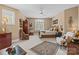 Spacious bedroom featuring neutral walls and carpet, an accent rug, and various décor and furniture at 5112 Mill Race Ln, Lancaster, SC 29720