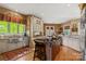 Spacious kitchen boasts a large island, custom cabinets, and a stainless steel sink at 5112 Mill Race Ln, Lancaster, SC 29720