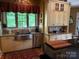 A stylish kitchen with stainless steel appliances and granite countertops at 5112 Mill Race Ln, Lancaster, SC 29720