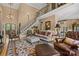 Elegant living room with high ceilings, a second story overlook, and cozy seating at 5112 Mill Race Ln, Lancaster, SC 29720