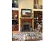 Cozy living room with custom built-ins, a stately fireplace, and a decorative area rug at 5112 Mill Race Ln, Lancaster, SC 29720