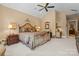 Spacious main bedroom featuring neutral walls, carpet, ceiling fan, and ample natural light at 5112 Mill Race Ln, Lancaster, SC 29720