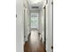 Hallway featuring hardwood floors and storage at 5229 Milford Rd, Charlotte, NC 28210