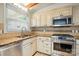 Updated kitchen featuring modern stainless steel appliances, and granite countertops at 5229 Milford Rd, Charlotte, NC 28210