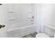 Bright bathroom features a tub with shower head and chrome fixtures at 556 Big Lick Rd, Stanfield, NC 28163