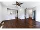 Spacious living room with hardwood floors, white walls, and an open concept design at 556 Big Lick Rd, Stanfield, NC 28163