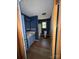Small full bathroom features blue paint, single sink vanity, toilet, and shower/tub combo at 5881 Robinhood Rd, Fort Lawn, SC 29714