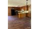 A kitchen featuring wood paneling, stainless steel appliances, and hardwood floors at 5881 Robinhood Rd, Fort Lawn, SC 29714