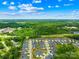 A scenic aerial view showcases the community surrounded by lush greenery at 6107 Gold Springs Way, Denver, NC 28037