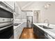 Modern kitchen featuring white cabinets, stainless steel appliances, and a stylish island at 6107 Gold Springs Way, Denver, NC 28037