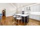 Bright kitchen with pendant lighting over a spacious island, stainless steel appliances, and stylish barstool seating at 6107 Gold Springs Way, Denver, NC 28037
