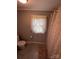 Bathroom featuring neutral gray paint, tile floors, and a shower/tub combo, complemented by white fixtures and trim at 621 N Craige St # 25 & 27, Salisbury, NC 28144