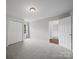 Cozy bedroom with carpeting, double closet and plenty of natural light at 6803 Ware Rd, Charlotte, NC 28212