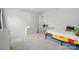Bright bedroom featuring a colorful bed, toy storage, and natural light at 812 Dogwood Creek Ln, Indian Trail, NC 28079