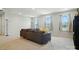 Spacious living room with large windows, neutral colors, and comfortable seating at 812 Dogwood Creek Ln, Indian Trail, NC 28079