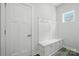 Mudroom with a built-in bench with storage and coat hooks at 812 Dogwood Creek Ln, Indian Trail, NC 28079