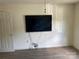 Empty bedroom with luxury vinyl plank floors and natural light at 8421 Coulwood Oak Ln, Charlotte, NC 28214