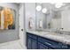 Bathroom featuring double vanity, granite countertops and modern fixtures at 849 Savile Ln, Fort Mill, SC 29715