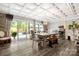 Elegant dining room with a large table, bench seating, and outdoor access at 849 Savile Ln, Fort Mill, SC 29715