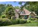 Brick home featuring a welcoming front entrance and professionally landscaped yard at 849 Savile Ln, Fort Mill, SC 29715