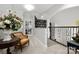 Upper hallway with chair and stairway at 849 Savile Ln, Fort Mill, SC 29715