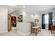 Bright hallway with seating and doorway to the game room at 849 Savile Ln, Fort Mill, SC 29715